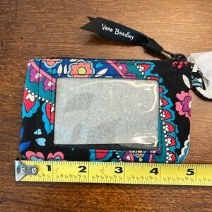 NWT Vera Bradley ID holder/zippered wallet. Dimensions in pics. Includes laynard